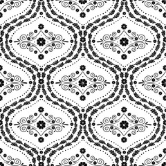 Seamless pattern with black floral ogee geometrical motifs on a white background. Monochrome classic abstract repeat wallpaper.