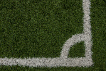 sport and game concept - close up of football field with line and grass