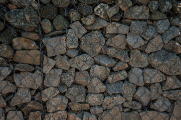 Ground stone background of many small stones.