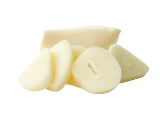 Front view of peeled white garlic cloves with slices or pieces in stack isolated with clipping path in png file format