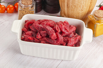 Raw beef meat - sliced strips