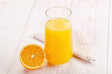 Sweet fresh orange juice in the glass