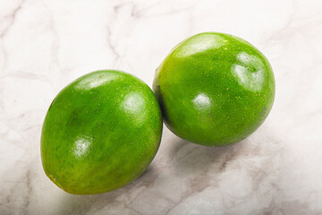 Two ripe green exotic avocado fruit