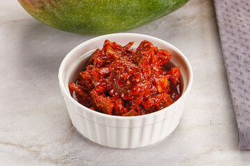 Spicy pickled raw green mango
