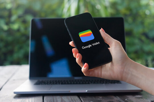 Google Wallet logo, a digital wallet for easy, secure payments, storing cards, and sending money quickly, displayed on iPhone screen