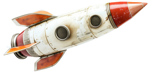 Vintage rocket model with a red tip and worn white body isolated on white