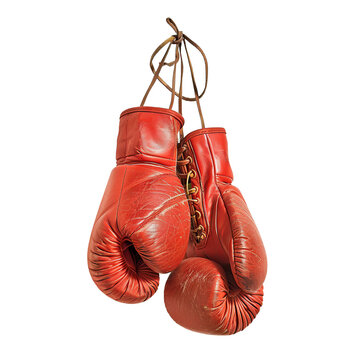 Pair of old red leather boxing gloves hanging, cut out