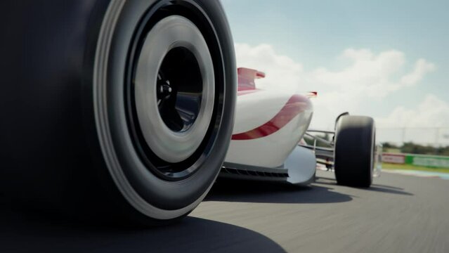 Low angle side view of a generic race car driving around a curve. Formula one racing.  Dynamic tracking shot. Multiple race cars. High quality 3d animation