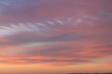 Pink and purple sunrise in the sky.
