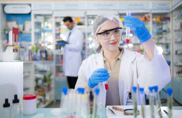 Chemical scientist doing antibiotic trials and testing in the laboratory