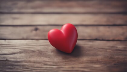 Happy Valentines Day. Red Heart on a wooden table.