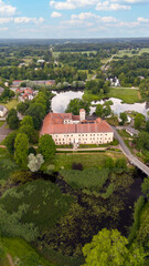 Aerial View Over Dundaga Town, Latvia. Medieval Dundaga Castle With Park and Lake. Old Lutheran Church and Cityscape of the Dundaga City Panorama. Landscape Design, Travel Destination in Latvia