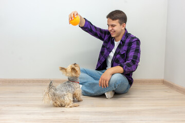 Man playing with his dog.