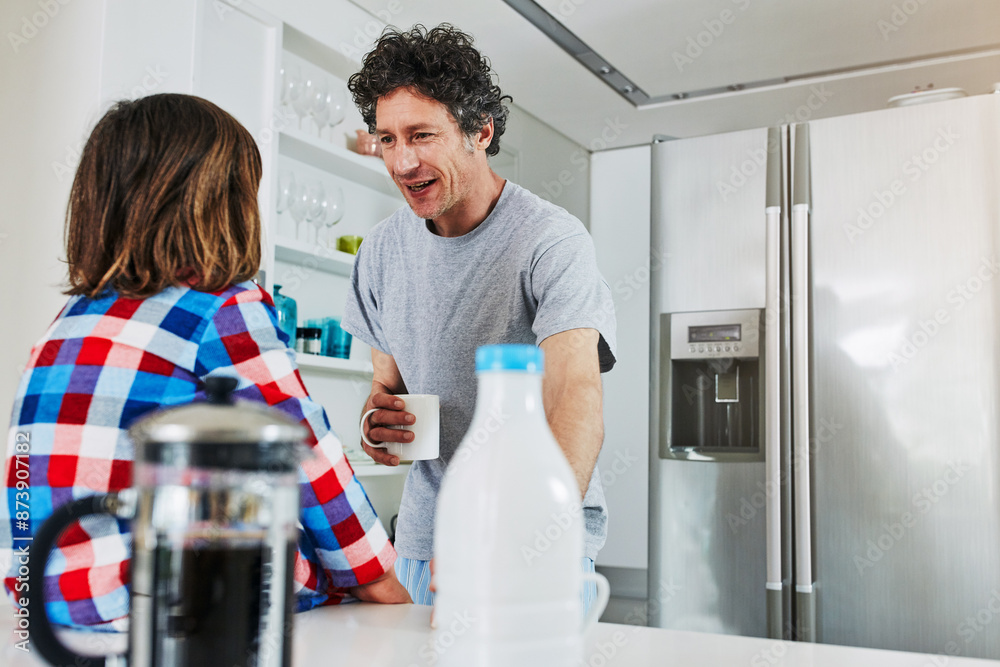 Canvas Prints Father, son and kitchen in home with coffee, morning and talking for education and conversation. Pajamas, breakfast and learning for milk and nutrition knowledge, dad person and child for wellness