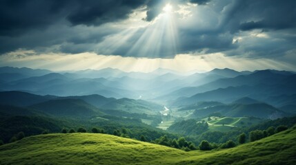 Obraz premium the morning sun shines through the clouds on the mountains of the valley and the forest in the fog.