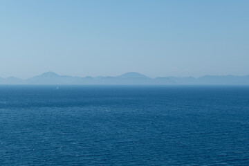 Obraz premium Bay views from green forests. View from the forest to the sea. Magnificent views from the forest to the sea. Magnificent bays of Muğla.