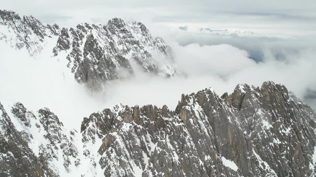 Aerial View of Snow Capped Rocky Peaks of Australian Alps, Innsbruck Ski Resort Area, Drone Shot