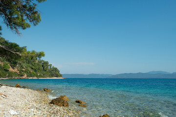 Bay views from green forests. View from the forest to the sea. Magnificent views from the forest to the sea. Magnificent bays of Muğla.