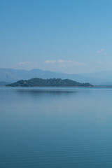 reflection of the forest in the lake.Bay views from green forests. View from the forest to the sea. Magnificent views from the forest to the sea. Magnificent bays of Muğla.