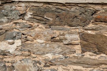 Fototapeta premium Ancient wall texture background with old bricks