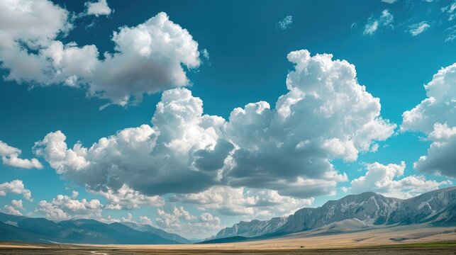 Scenic sky with clouds above mountains