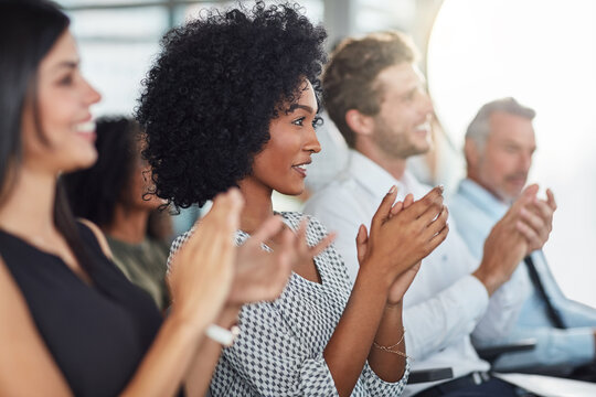 Clapping, women and smile in seminar, group and audience in event, training and presentation in boardroom. Workshop, applause and celebrating of conference, entrepreneurship and listen to masterclass