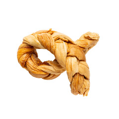 Braided dried melon. Dried melon in form of pigtail isolated on white background. Natural sweet dessert.