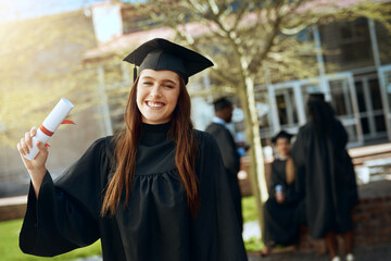 Graduation, portrait and happy woman with degree at university, success or achievement in...