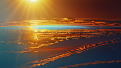 Ethereal sunset over a rippling ocean surface, with golden rays reflecting off the waves, creating a mesmerizing and tranquil view.