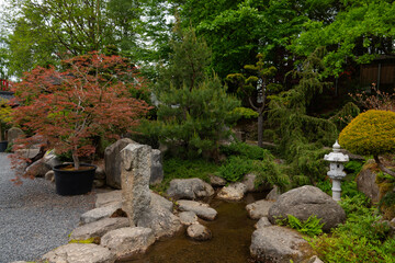  japanese garden with scenic stones and lush foliage