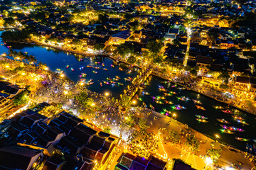 Aerial view of Hoi An Ancient Town with lantern boats on Hoai river, in Hoi An, Vietnam