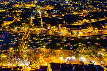 Aerial view of Hoi An Ancient Town with lantern boats on Hoai river, in Hoi An, Vietnam