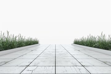 Fototapeta premium Modern walkway with large stone tiles, lush grass, and clear blue sky, creating a fresh and inviting atmosphere.