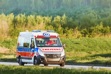 Countryside ambulance driving on sunny day © AlexGo
