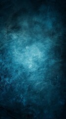 Fototapeta premium Abstract blue background with bright center spotlight and dark vignette border frame with vintage grunge background texture.