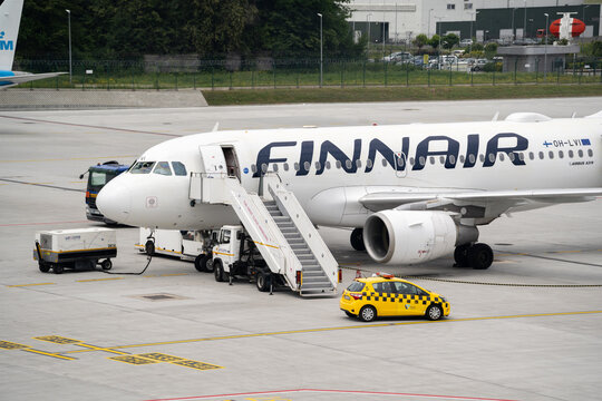 Finnair airlines Airbus A319 airplane at John Paul II International Krak&oacute;w Balice Airport near Cracow. Flag carrier of Finland. Plane ground handling before departure on June 11, 2024 in Krakow, Polan