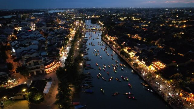 Aerial view of Hoi An Ancient Town with lantern boats on Hoai river, in Hoi An, Vietnam
