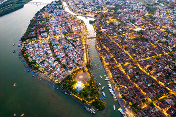 Aerial view of Hoi An Ancient Town with lantern boats on Hoai river, in Hoi An, Vietnam