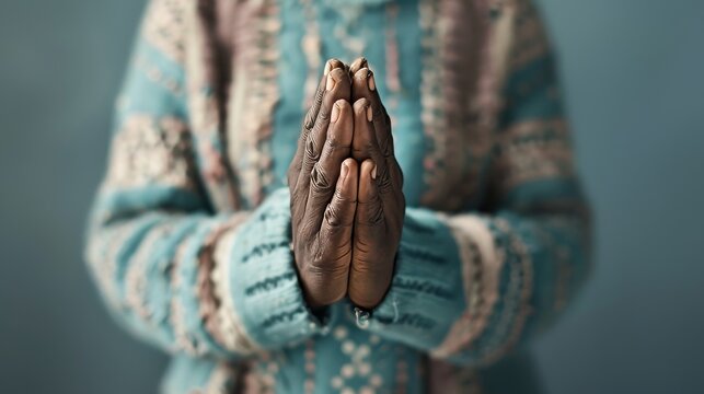 People's hands clasped together in prayer. fingers interlocked and gently press the palm Quiet moments reflect deep spirituality and inner peace. It reflects a powerful expression of faith and respect