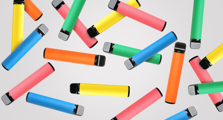 Falling disposable electronic cigarettes on grey background