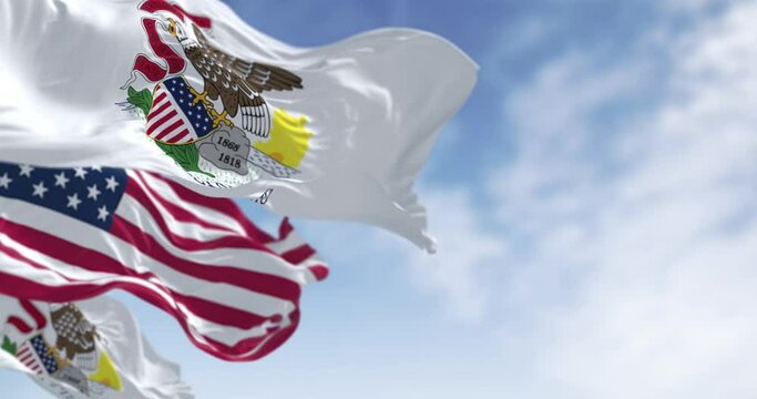 Illinois state flags waving with the national flag of the American flags