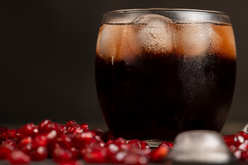 cold pomegranate seed juice with chunks of ice