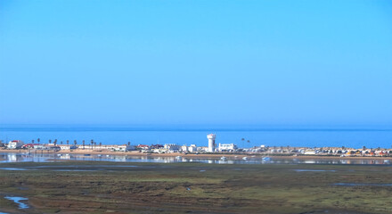 Aerial view of Faro peninsula named Isle of Faro or ilha de Faro at the Algarve coast of Portugal