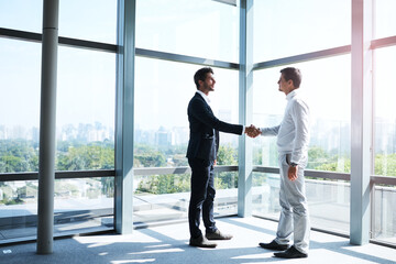 Business men, handshake and meeting with welcome for thank you, greeting or introduction in office....