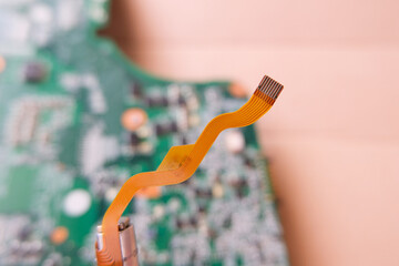 Flexible data cable used in high-tech electronic devices. Focused on the flat cable.