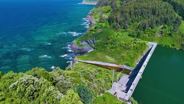 Urbieta Reservoir, the closest to the sea in Spain, in the surroundings of the abandoned Lemoniz Nuclear Power Plant. Aerial view from a drone. Lemoniz. Vizcaya. Basque Country. Spain. Europe