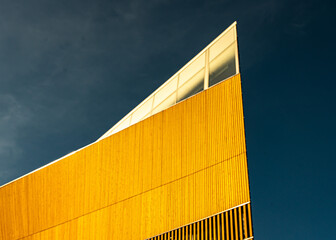 Beautiful Yellow Wall and Blue Sky: Exterior Views of Oodi Library