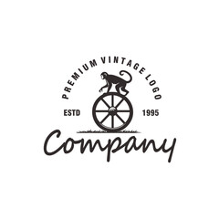 monkey on wheels circus vintage silhouette logo design vector graphic