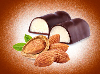 Closeup shot of cut marzipan chocolate on brown background. Marzipan candy.