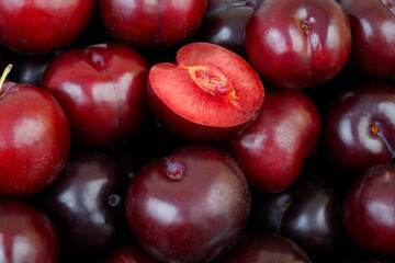 Ripe cherry plums as background